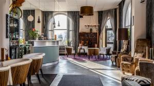 Χώρος καθιστικού στο Home Hotel Post