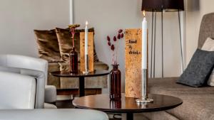 Χώρος καθιστικού στο Home Hotel Post