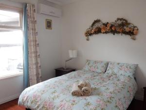 Ένα ή περισσότερα κρεβάτια σε δωμάτιο στο Donsonhome