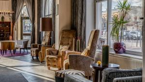 Χώρος καθιστικού στο Home Hotel Post