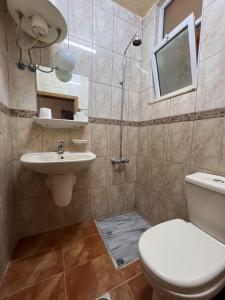 Koupelna v ubytování Dweik Hotel 1