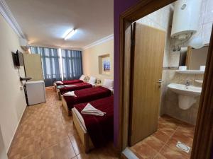 Koupelna v ubytování Dweik Hotel 1