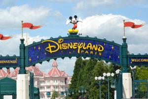 a sign for disneyland parades at a disney park at DOMITYS SARIA in Serris +17 photos