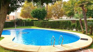 The swimming pool at or close to Modern 2 Bedroom Apartment 100 m From The Beach