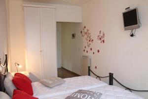 Posteľ alebo postele v izbe v ubytovaní L'Iris B&B