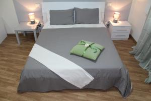 Posteľ alebo postele v izbe v ubytovaní L'Iris B&B