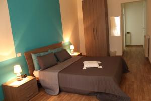 Posteľ alebo postele v izbe v ubytovaní L'Iris B&B