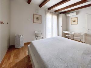 A bed or beds in a room at UR NEST Santo Stefano