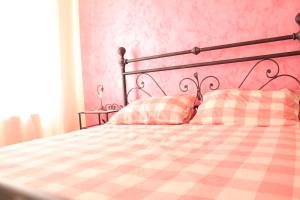 Posteľ alebo postele v izbe v ubytovaní L'Iris B&B