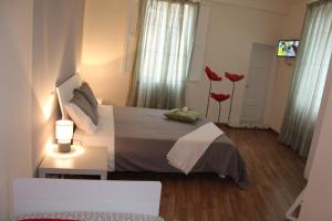 Posteľ alebo postele v izbe v ubytovaní L'Iris B&B