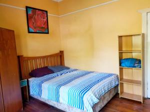 Postel nebo postele na pokoji v ubytování St Kilda East backpackers' hostel