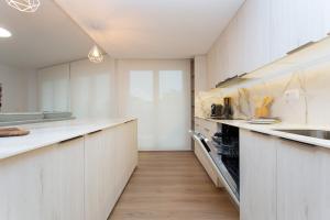 A kitchen or kitchenette at Edificio Peñiscola