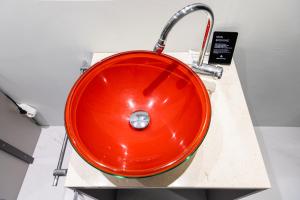 a red sink on a counter in a room at HOTEL LENITH Seomyeon in Busan