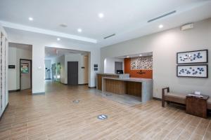 a lobby of a hospital with a desk and a counter at Candlewood Suites Apex Raleigh Area, an IHG Hotel in Apex