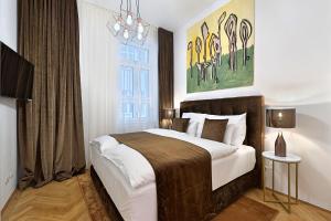 Tempat tidur dalam kamar di Apartments Schlossgasse - Exclusive opportunity since construction close by