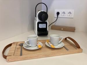 Coffee and tea making facilities at Apartamento céntrico, climatizado y totalmente equipado de 3 habitaciones para 6-7 personas