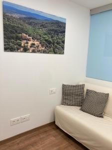 A seating area at Apartamento céntrico, climatizado y totalmente equipado de 3 habitaciones para 6-7 personas