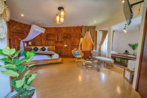 Postel nebo postele na pokoji v ubytování Tea Resort