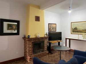 Część wypoczynkowa w obiekcie Casas Rurales Monasterio de Rocamador