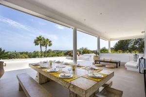 A balcony or terrace at Staggering Ibiza Villa Can Felipe 6 Bedrooms Private Gym Childrens Play Area Sant Josep