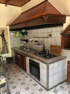 A kitchen or kitchenette at Residenza Li Cardilli