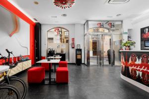 TV a/nebo společenská místnost v ubytování Hotel Del Pintor