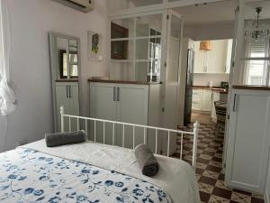 Кровать или кровати в номере La Casita Boutique San Andrés