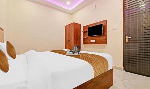 TV a/nebo společenská místnost v ubytování FabHotel Metro Inn