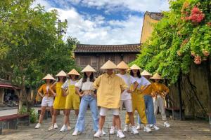 a group of people wearing hats standing together at City Hostel Da Nang in Danang