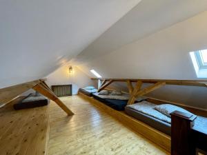 a room with two bunk beds in a attic at Zengő in Miercurea-Ciuc