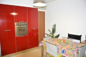 Kuchyň nebo kuchyňský kout v ubytování Orchidea apartments