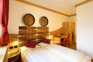 En eller flere senge i et værelse på Agriturismo Eredi di Cobelli Aldo