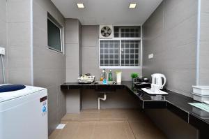 a bathroom with a sink and a toilet in it at Menjalara Kepong Desapark & MITEC 中文房东-Room Only in Kuala Lumpur