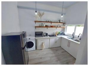 Kuchyň nebo kuchyňský kout v ubytování Villa Boheme