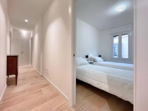 Posteľ alebo postele v izbe v ubytovaní UR NEST San Giorgio