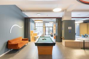 a billiard room with a pool table at Camplus Regio Parco in Turin