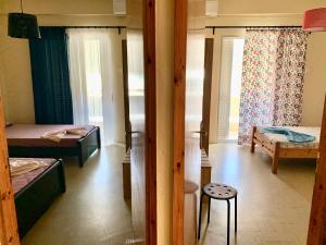 Posteľ alebo postele v izbe v ubytovaní Nikol Apartments