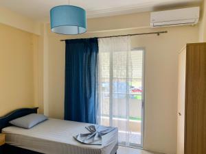 Posteľ alebo postele v izbe v ubytovaní Nikol Apartments