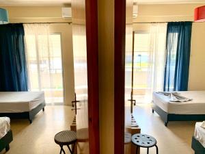 Posteľ alebo postele v izbe v ubytovaní Nikol Apartments