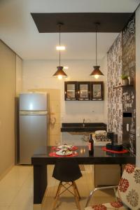 Kuchyň nebo kuchyňský kout v ubytování Casa Pequena, Completa e Aconchegante - Tiny House