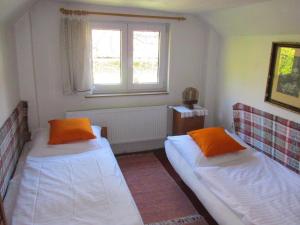 Postel nebo postele na pokoji v ubytování Holiday House Maluzina Low Tatras