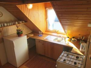 Kuchyň nebo kuchyňský kout v ubytování Holiday House Maluzina Low Tatras