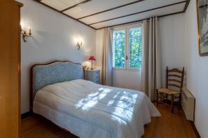 Postel nebo postele na pokoji v ubytování Chalet des Melezes