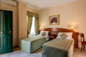 Postel nebo postele na pokoji v ubytování Marini Park Hotel