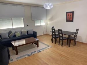 Χώρος καθιστικού στο Résidence les Ambassadeurs