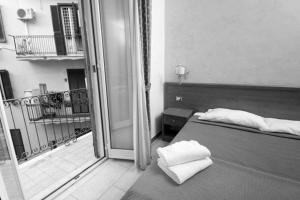 Posteľ alebo postele v izbe v ubytovaní Cesar Palace Guesthouse