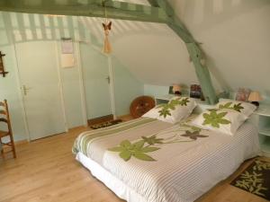 Postel nebo postele na pokoji v ubytování Maison d'Hôtes La Quèrière
