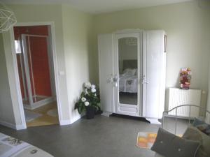 Postel nebo postele na pokoji v ubytování Maison d'Hôtes La Quèrière