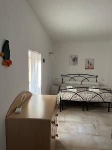 Postel nebo postele na pokoji v ubytování Trulli bella vite