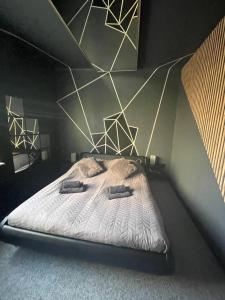 Posteľ alebo postele v izbe v ubytovaní Apartamenty Konopnicka